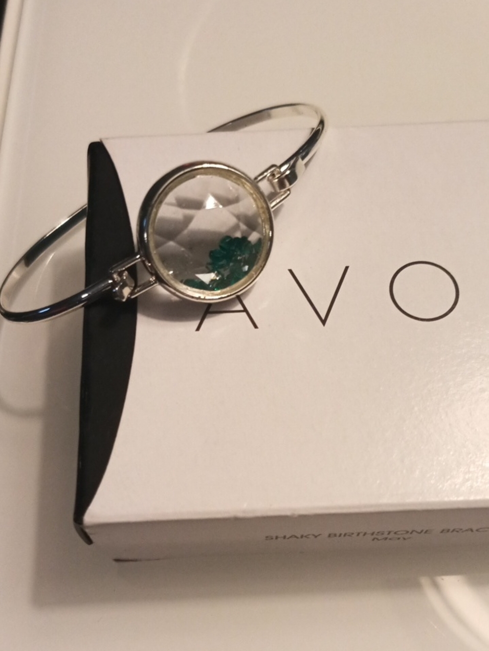 Avon Silver-Tone Bangle with Green Accent Shaky Charm